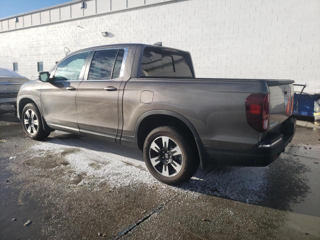 Photo 2 from auction – 2020 HONDA RIDGELINE with VIN 5FPYK3F57LB020051