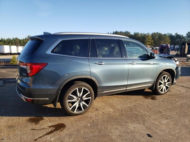 Photo 3 from auction – 2021 HONDA PILOT ELIT with VIN 5FNYF6H04MB041392