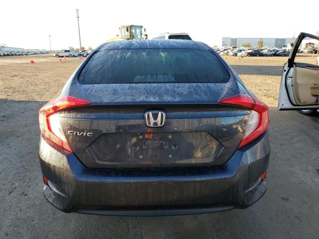 Photo 6 from auction – 2018 HONDA CIVIC LX with VIN 19XFC2F58JE010204
