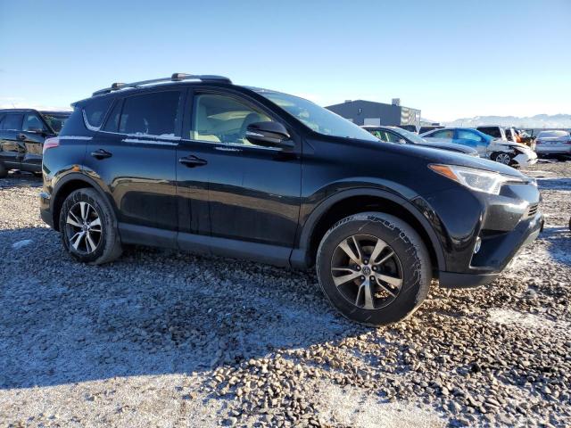 Photo 4 from auction – 2017 TOYOTA RAV4 XLE with VIN 2T3RFREV6HW650084