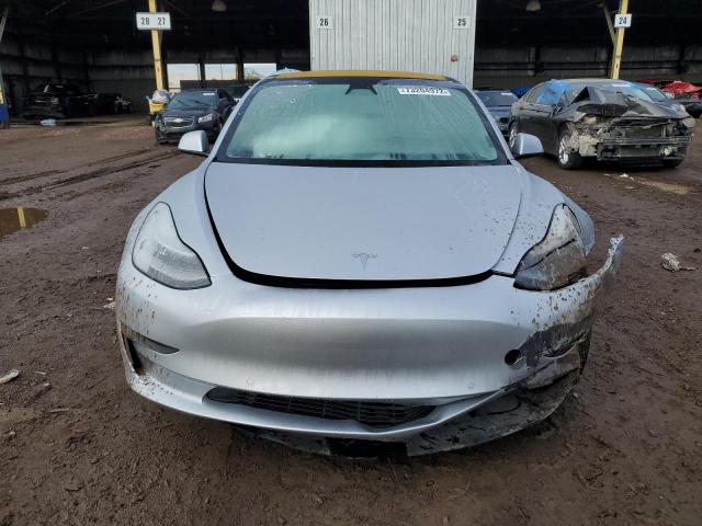 Photo 5 from auction – 2018 TESLA MODEL 3 with VIN 5YJ3E1EA2JF040525