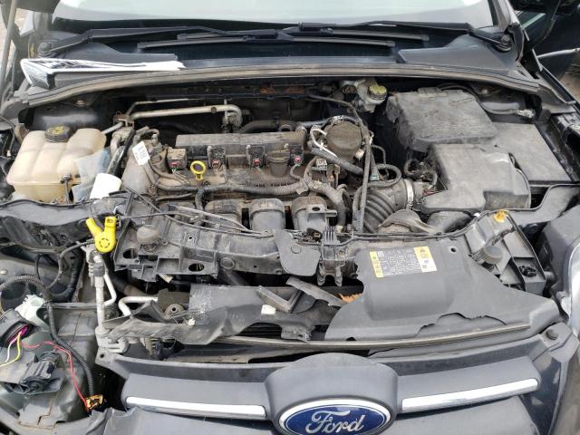Photo 11 from auction – 2014 FORD FOCUS SE with VIN 1FADP3F26EL379704