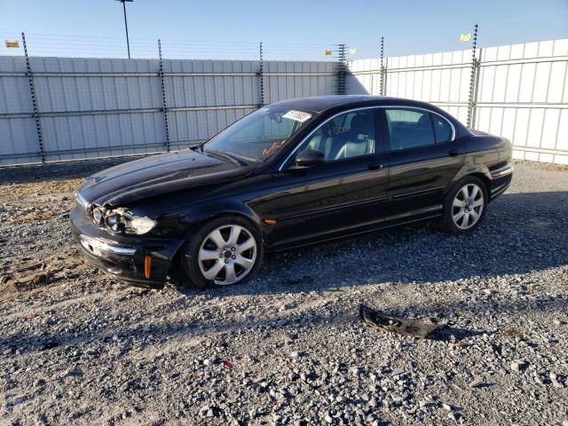 JAGUAR X-TYPE 3.0 2004 with VIN SAJEA51C74WD89994 - Photo from auction