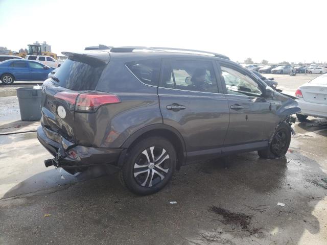 Photo 3 from auction – 2018 TOYOTA RAV4 LE with VIN 2T3ZFREV3JW452150
