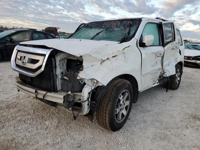 HONDA PILOT TOUR 2011 with VIN 5FNYF4H98BB005432 - Photo from auction