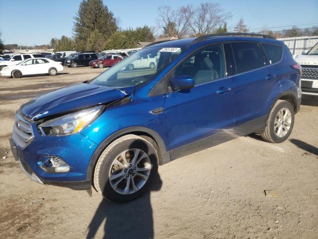 FORD ESCAPE SE 2018 with VIN 1FMCU0GD1JUD26521 - Photo from auction