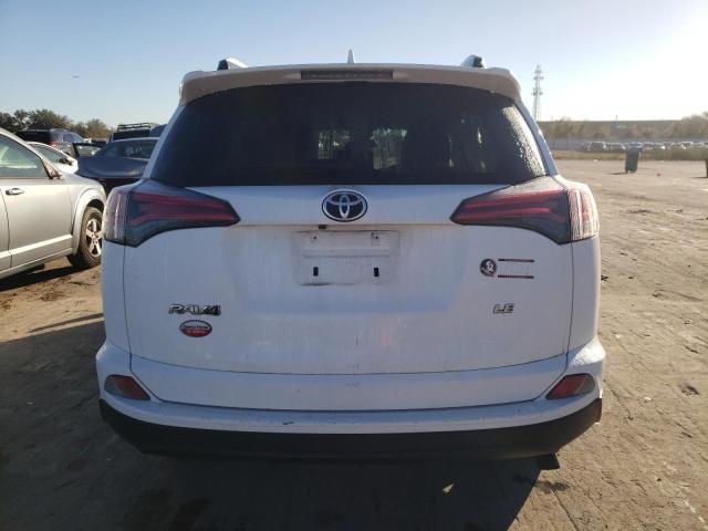 Photo 6 from auction – 2018 TOYOTA RAV4 LE with VIN JTMZFREV3JJ742693