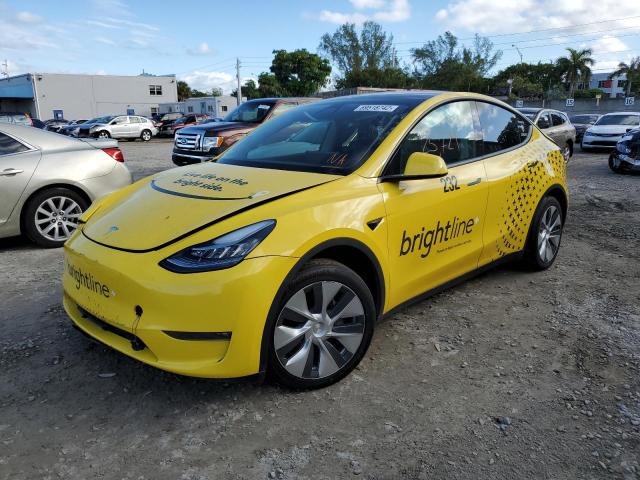 TESLA MODEL Y 2022 with VIN 7SAYGAEE6NF329712 - Photo from auction