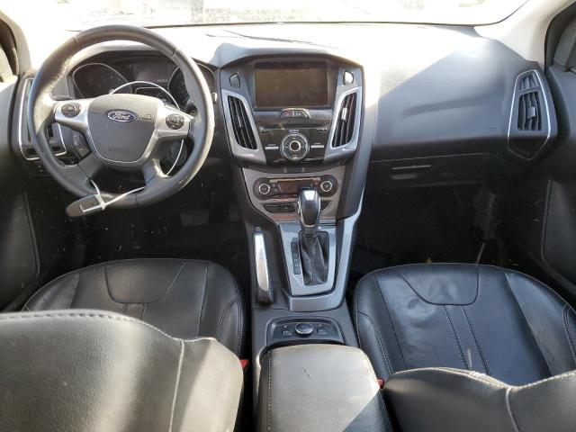 Photo 8 from auction – 2014 FORD FOCUS TITA with VIN 1FADP3J28EL162517
