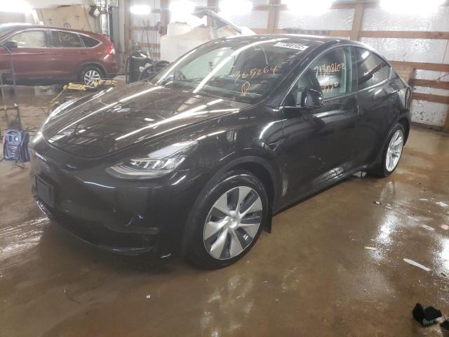 TESLA MODEL Y 2022 con VIN 7SAYGAEE9NF365264 - Foto de la subasta