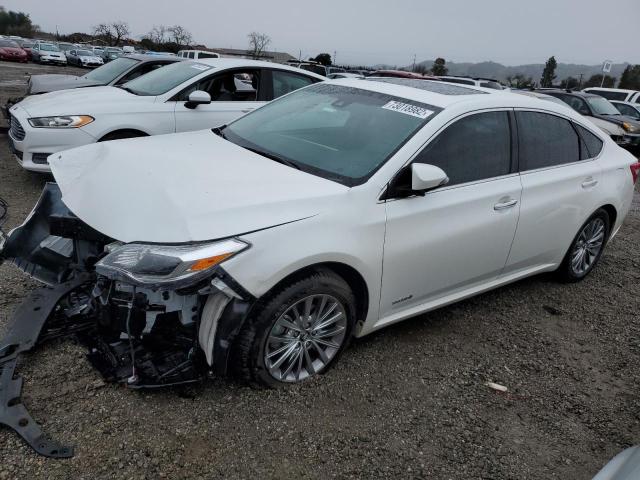 TOYOTA AVALON HYB 2016 with VIN 4T1BD1EB0GU055771 - Photo from auction
