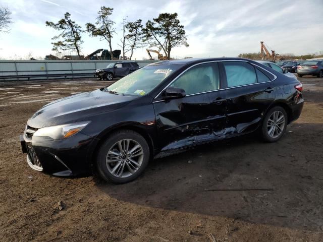 TOYOTA CAMRY LE 2017 with VIN 4T1BF1FK2HU724004 - Photo from auction