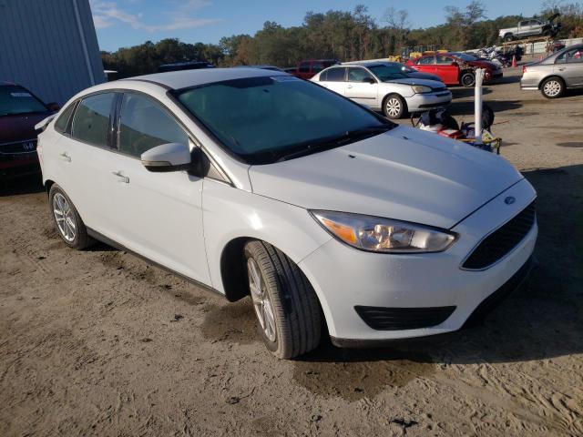 Photo 4 from auction – 2017 FORD FOCUS SE with VIN 1FADP3F29HL290990