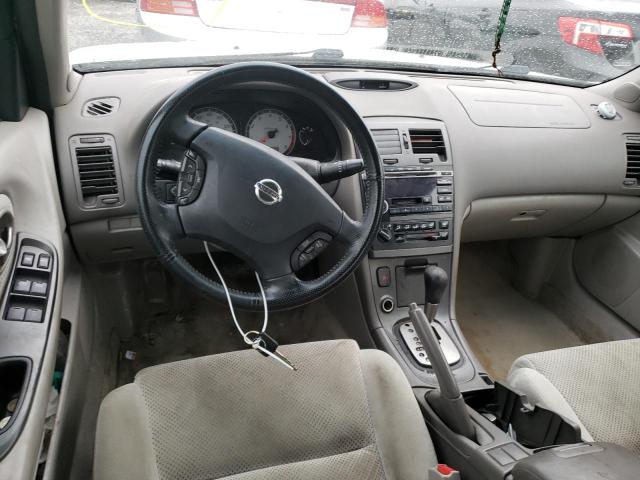 Photo 8 from auction – 2003 NISSAN MAXIMA GLE with VIN JN1DA31D13T521848