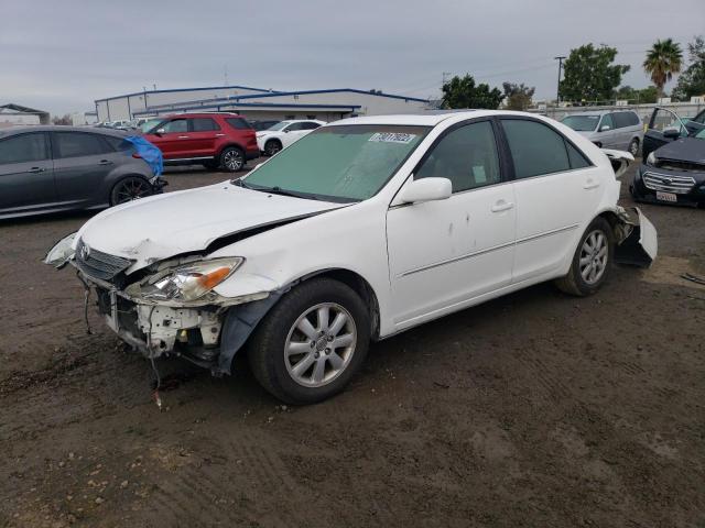 TOYOTA CAMRY LE 2004 with VIN JTDBF32K940153604 - Photo from auction