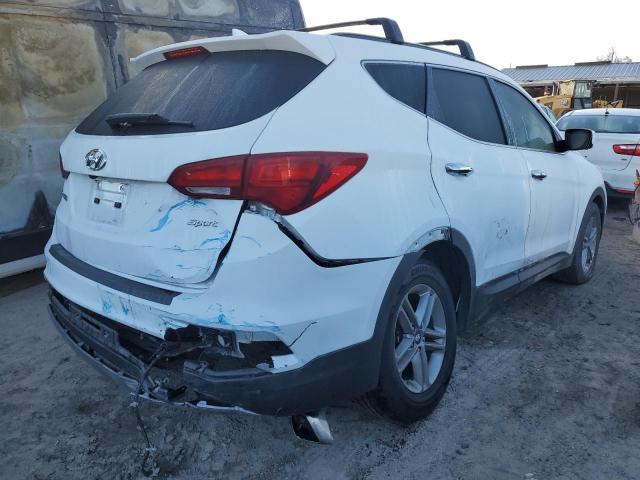 Photo 3 from auction – 2017 HYUNDAI SANTA FE S with VIN 5NMZU3LB2HH041915