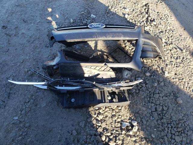Photo 13 from auction – 2016 FORD ESCAPE TIT with VIN 1FMCU0JX6GUA10673