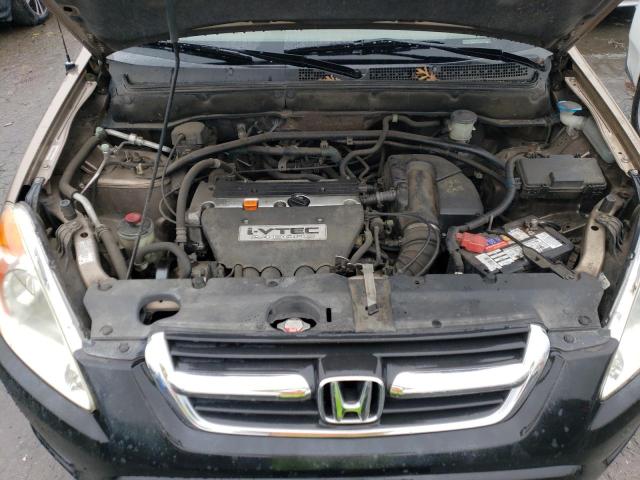 Photo 11 from auction – 2004 HONDA CR-V LX with VIN JHLRD78434C053522