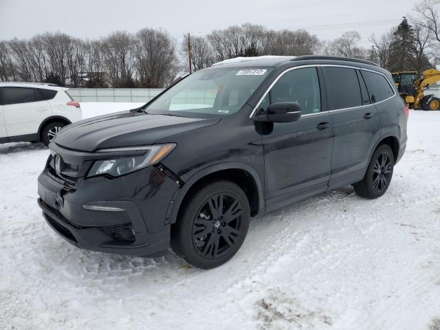 HONDA PILOT SE 2022 with VIN 5FNYF6H20NB024088 - Photo from auction