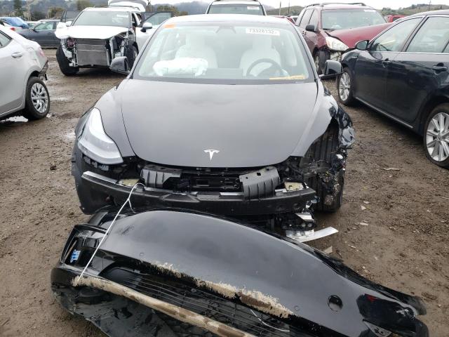 Photo 5 from auction – 2021 TESLA MODEL 3 with VIN 5YJ3E1EC3MF995565