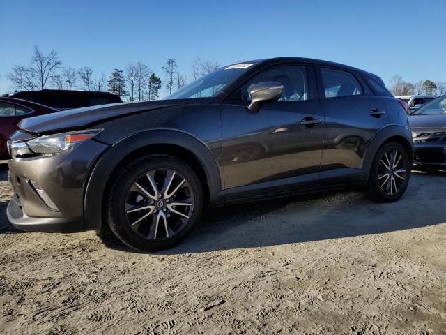 MAZDA CX-3 TOURI 2018 with VIN JM1DKDC78J0332653 - Photo from auction