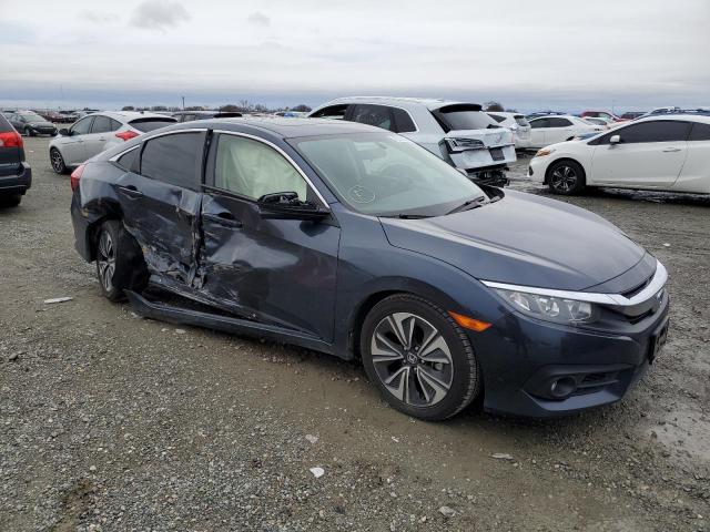 Photo 4 from auction – 2018 HONDA CIVIC EX with VIN JHMFC1F32JX004101
