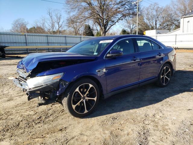 FORD TAURUS SEL 2014 with VIN 1FAHP2E84EG121059 - Photo from auction