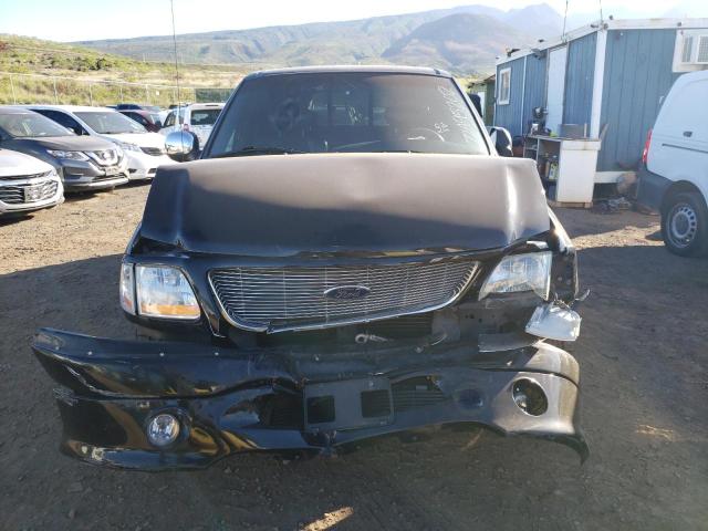 Photo 5 from auction – 2001 FORD F150 SUPER with VIN 1FTRW07L61KB10563