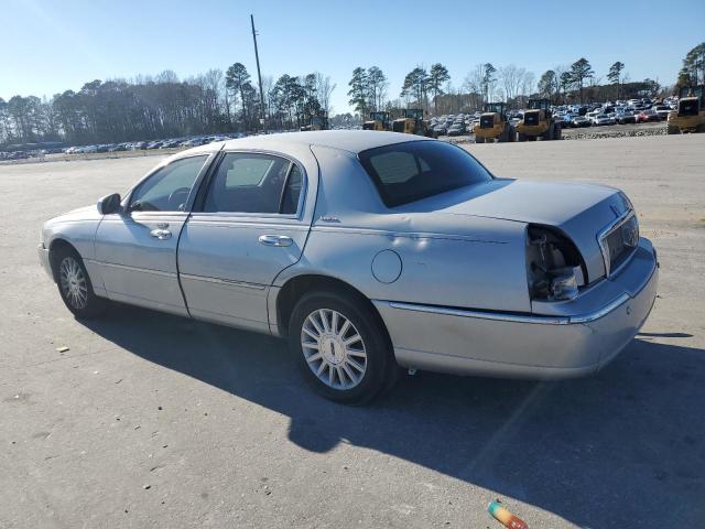Photo 2 from auction – 2004 LINCOLN TOWN CAR E with VIN 1LNHM81W44Y619793