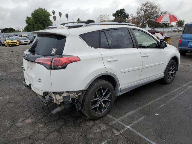 Photo 3 from auction – 2016 TOYOTA RAV4 SE with VIN JTMJFREV9GJ101943