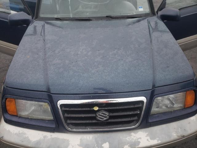 Photo 11 from auction – 1996 SUZUKI SIDEKICK S with VIN JS3TD21VXT4100998