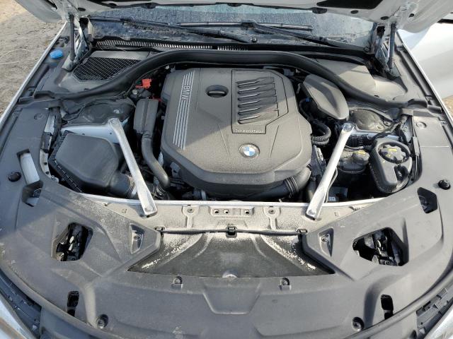 Photo 11 from auction – 2021 BMW 840XI with VIN WBAGV4C00MCF65565