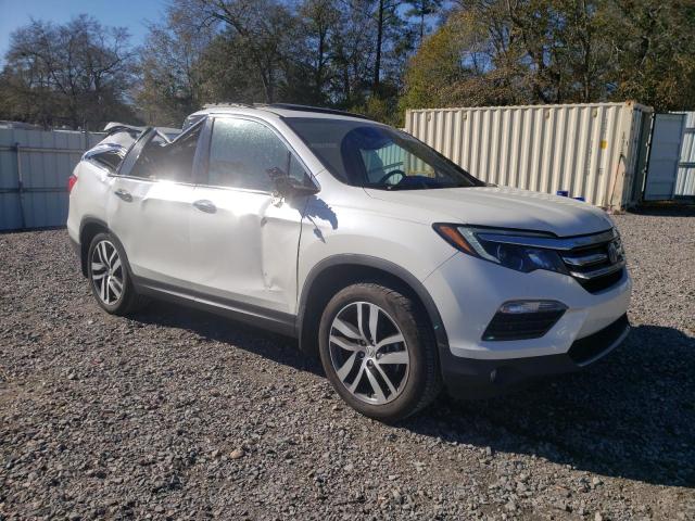 Photo 4 from auction – 2016 HONDA PILOT TOUR with VIN 5FNYF5H91GB051939