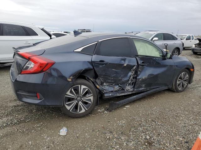 Photo 3 from auction – 2018 HONDA CIVIC EX with VIN JHMFC1F32JX004101