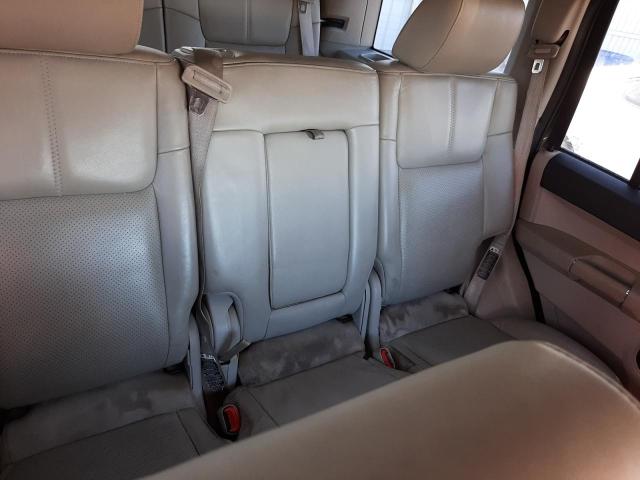 Photo 11 from auction – 2006 JEEP COMMANDER with VIN 1J8HG58236C124409