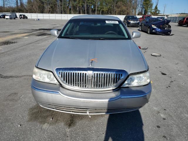 Photo 5 from auction – 2004 LINCOLN TOWN CAR E with VIN 1LNHM81W44Y619793