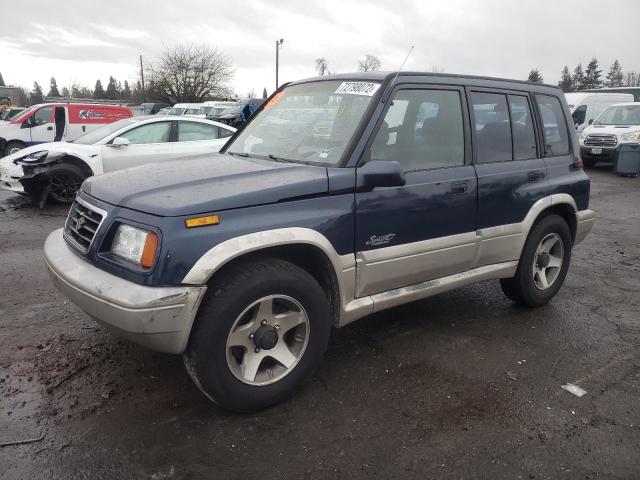 SUZUKI SIDEKICK S 1996 with VIN JS3TD21VXT4100998 - Photo from auction