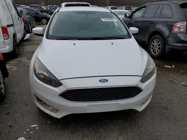 Photo 5 from auction – 2018 FORD FOCUS SE with VIN 1FADP3F20JL250593
