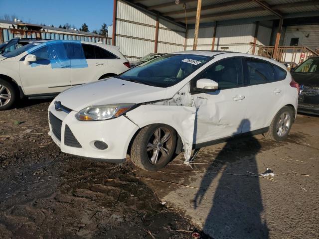 FORD FOCUS SE 2014 with VIN 1FADP3K29EL222285 - Photo from auction