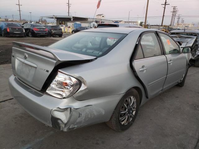 Photo 3 from auction – 2002 TOYOTA CAMRY LE with VIN JTDBE32KX20034220