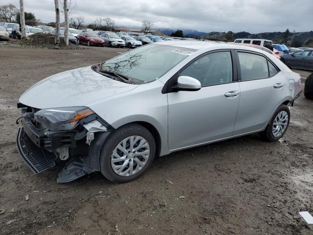 TOYOTA COROLLA L 2018 with VIN 5YFBURHE9JP823776 - Photo from auction