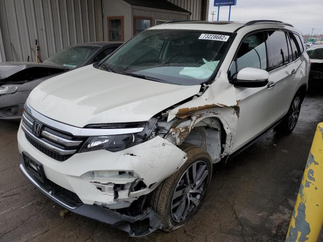 HONDA PILOT TOUR 2018 with VIN 5FNYF6H90JB018038 - Photo from auction
