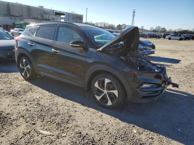 Photo 4 from auction – 2016 HYUNDAI TUCSON LIM with VIN KM8J3CA23GU174205