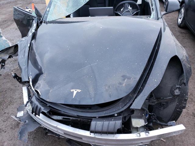 Photo 11 from auction – 2022 TESLA MODEL 3 with VIN 5YJ3E1EA1NF289209