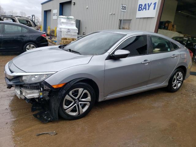 HONDA CIVIC LX 2018 with VIN 19XFC2F55JE036680 - Photo from auction