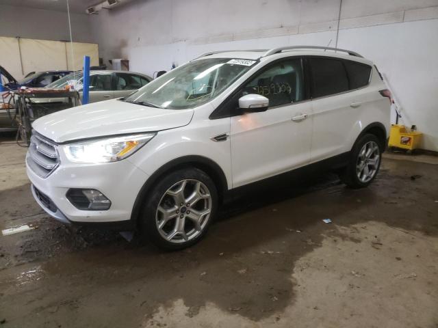 FORD ESCAPE TIT 2017 with VIN 1FMCU0J90HUE34191 - Photo from auction
