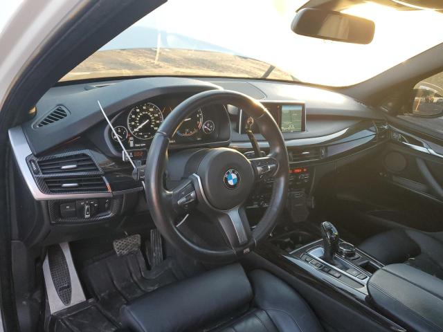 Photo 8 from auction – 2014 BMW X5 XDRIVE5 with VIN 5UXKR6C59E0J71618