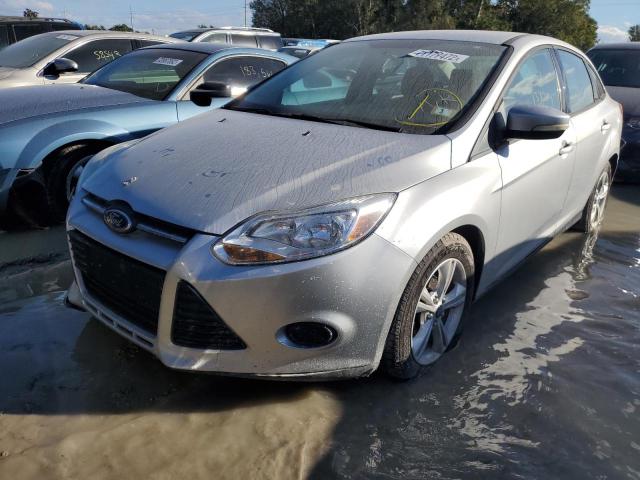 FORD FOCUS SE 2013 with VIN 1FADP3F21DL103090 - Photo from auction