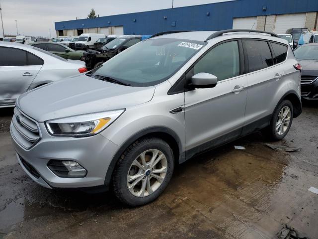 FORD ESCAPE SE 2018 with VIN 1FMCU0GD8JUD38214 - Photo from auction