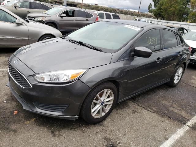 FORD FOCUS SE 2018 with VIN 1FADP3F27JL288368 - Photo from auction